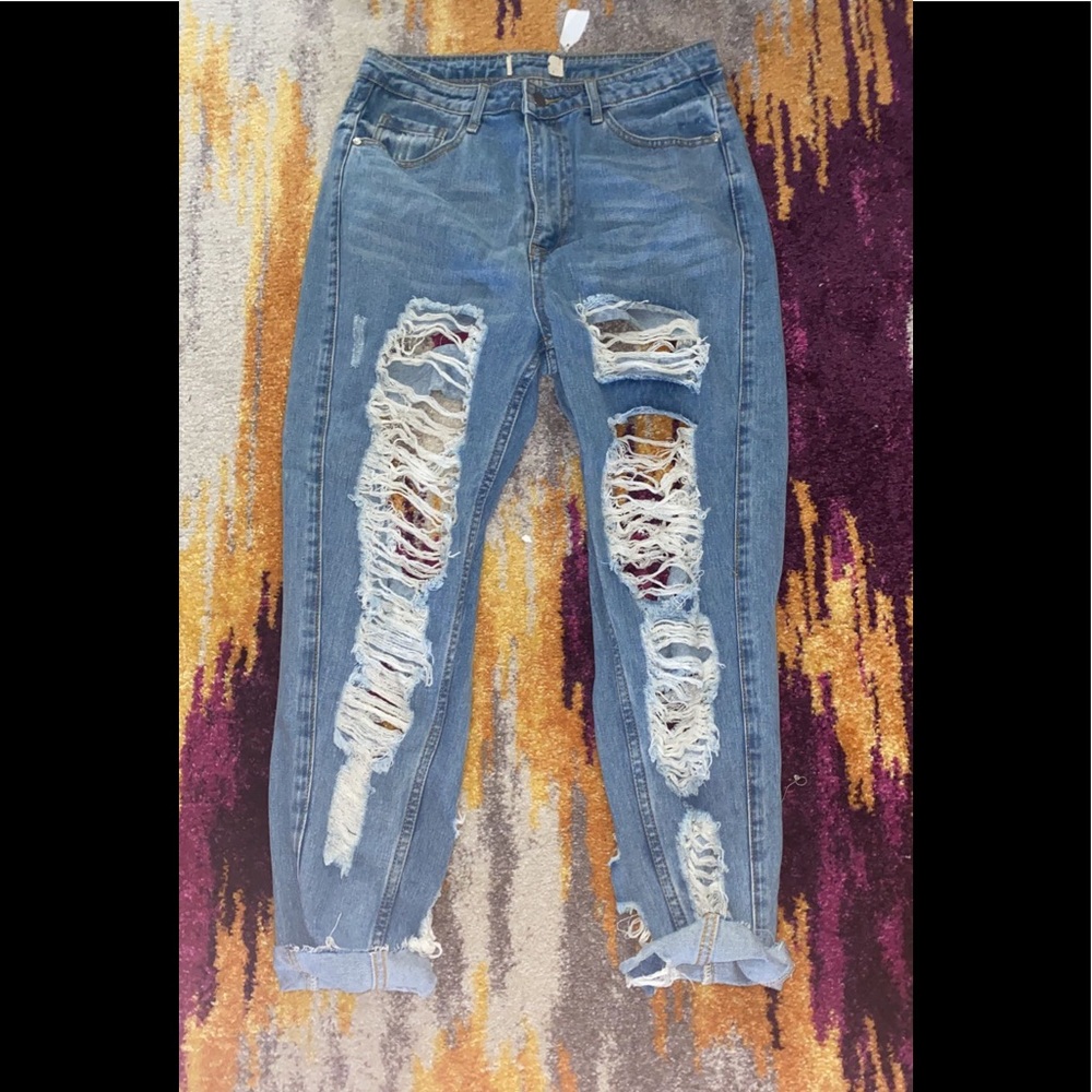 Ripped everywhere mom jeans